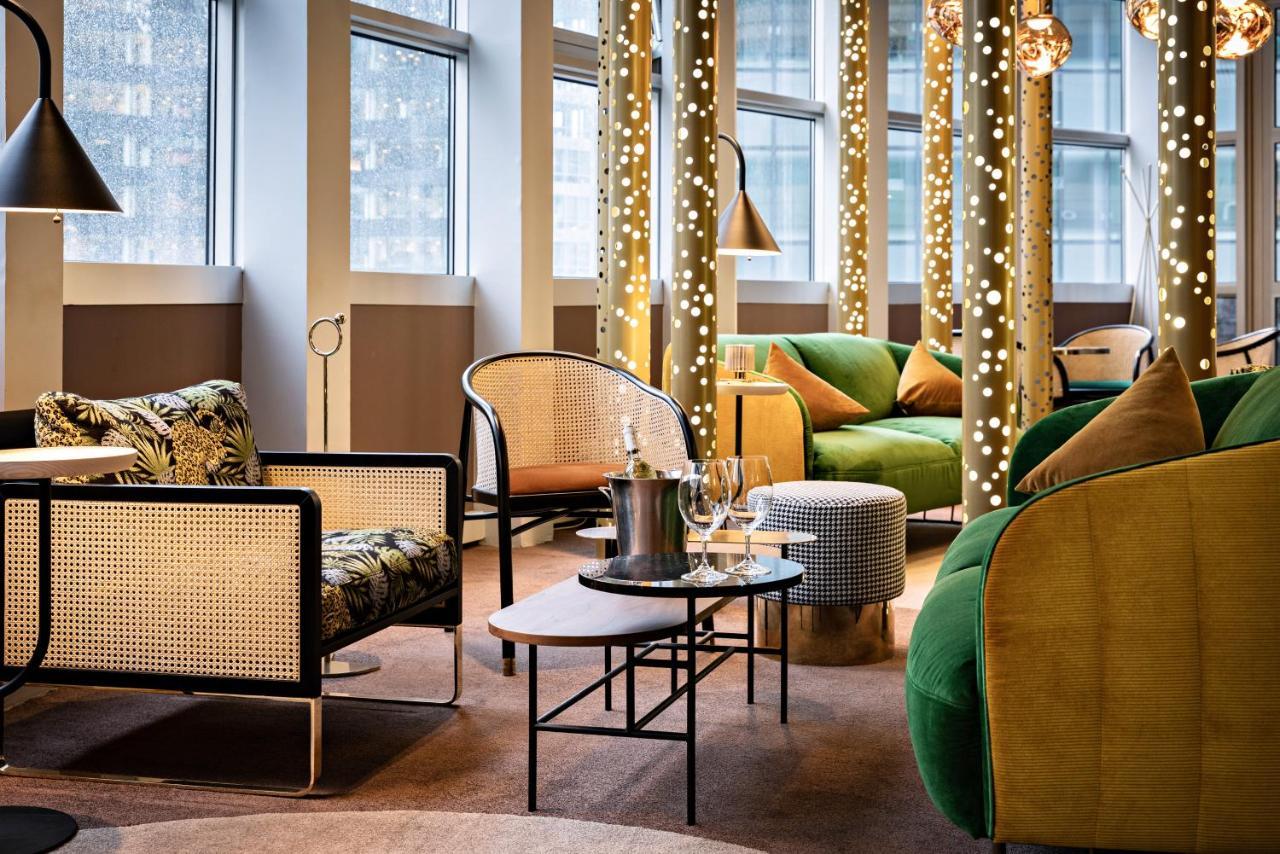 Pullman Paris La Defense Otel Courbevoie Dış mekan fotoğraf The Lounge at the top of the hotel