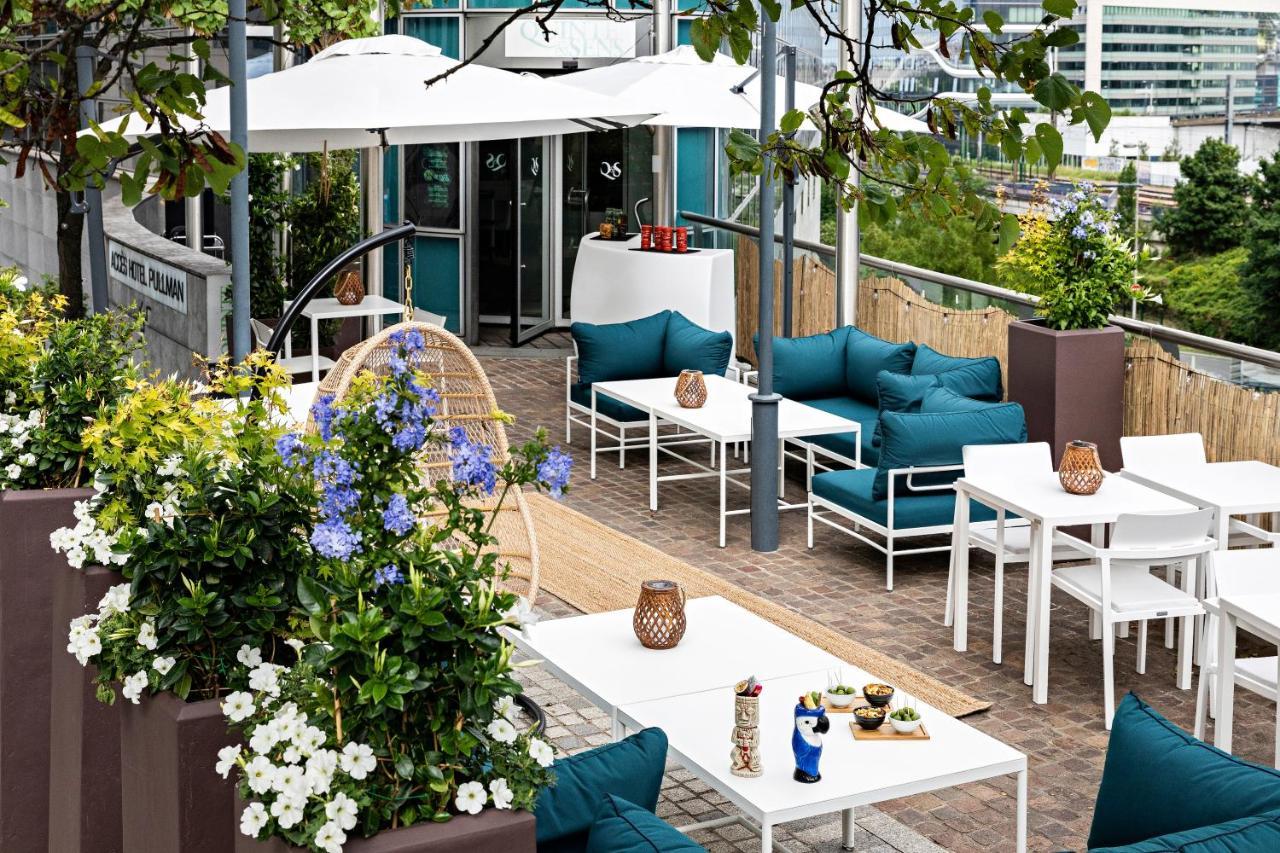 Pullman Paris La Defense Otel Courbevoie Dış mekan fotoğraf The rooftop bar